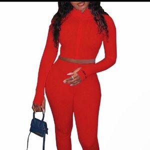 Red large size fits like a medium. Brand new never been worn